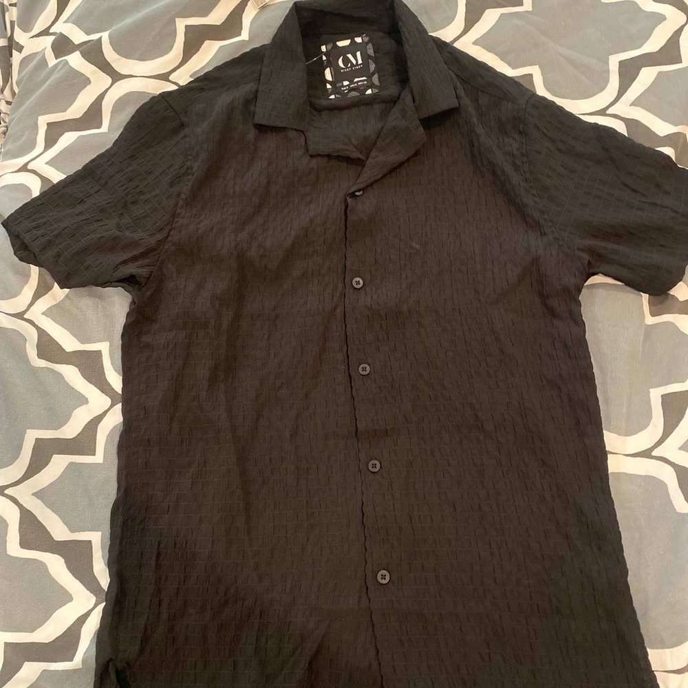 Black Ricky Singh casual button down shirts.